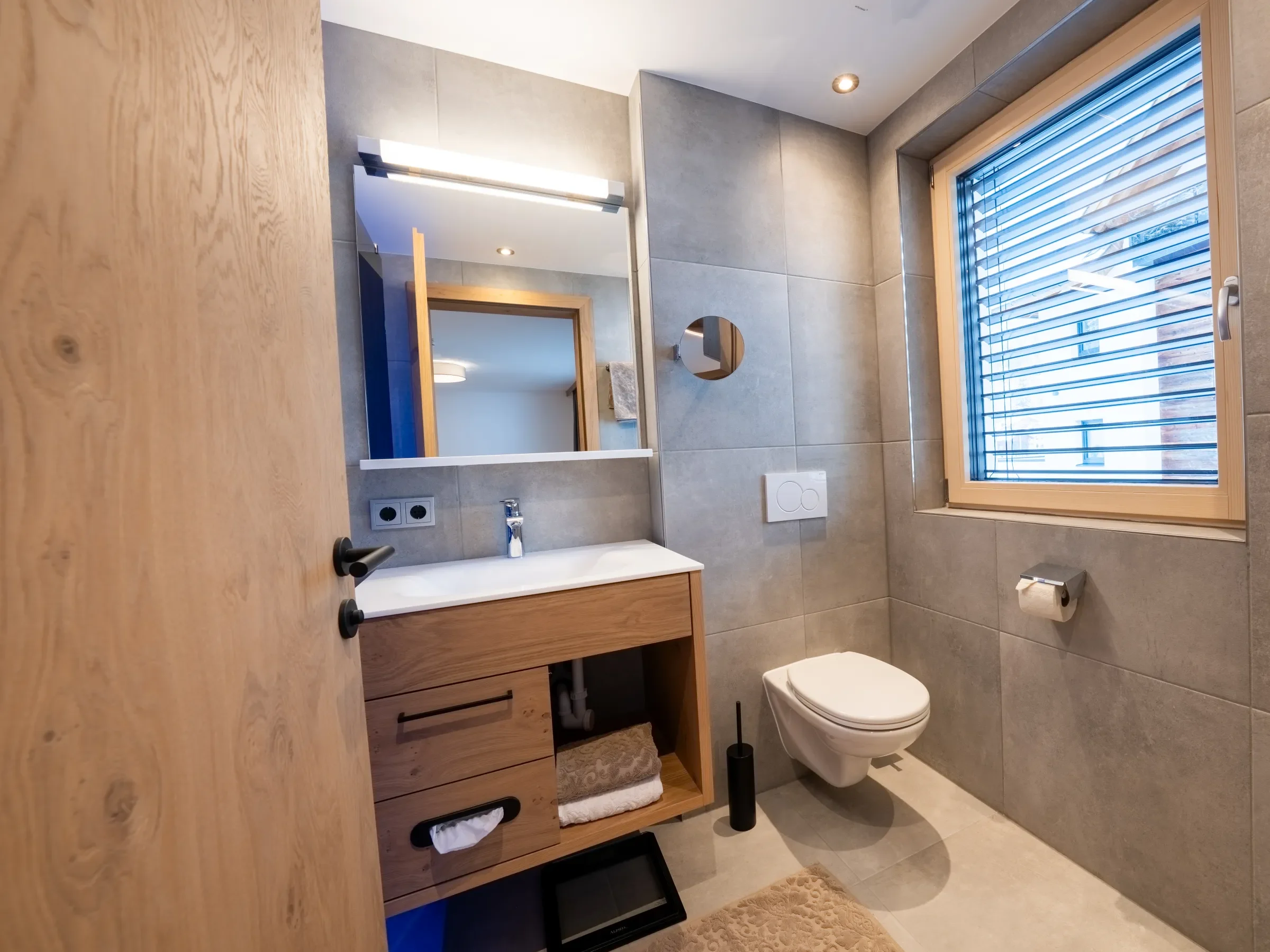 doppelzimmer-alpin-badezimmer-hotel-castel-ischgl